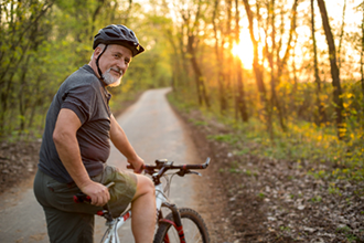 Baby Boomer riding bicycle